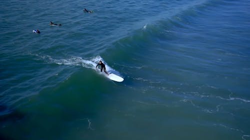 Surfer trains in Manhattan Beach 3