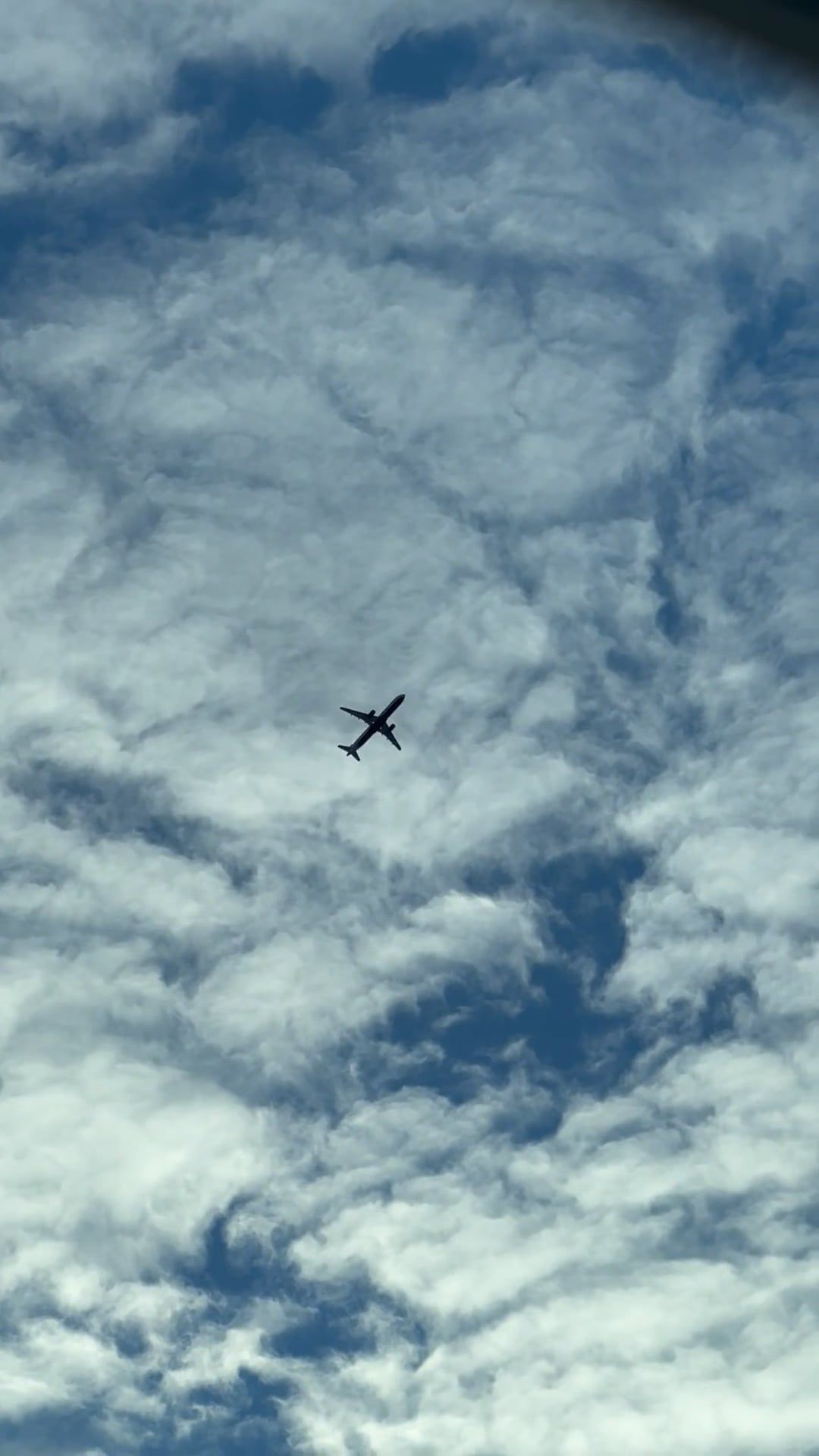A plane flying through the clouds in the sky Free Stock Video Footage ...