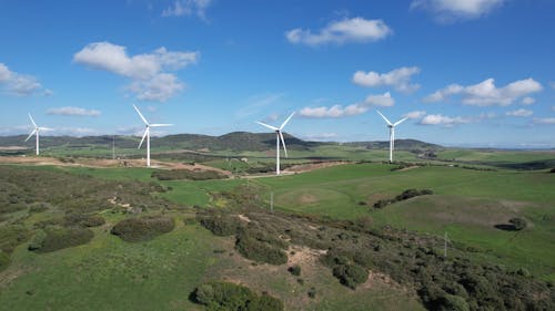 Above windmills drone aerial footage for background 