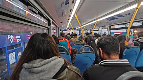 People travelling on the bus, Ealing London England 