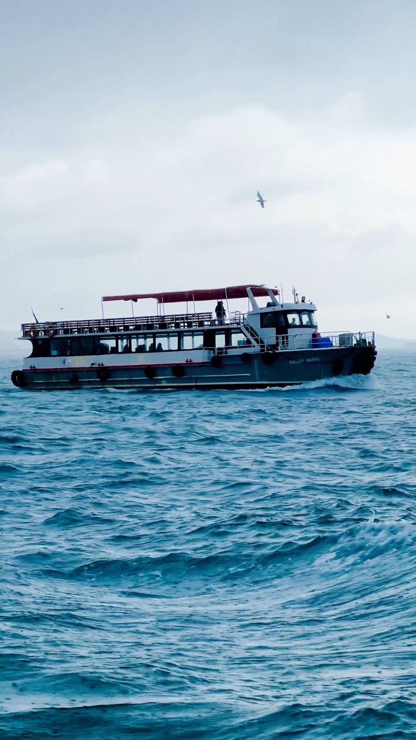 A boat traveling through the ocean with a large sail Free Stock Video ...