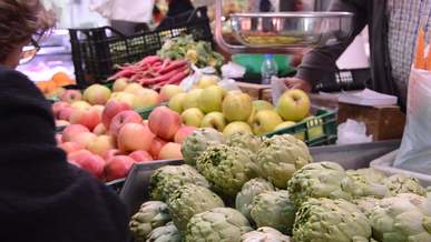 woman buying fruits in the market