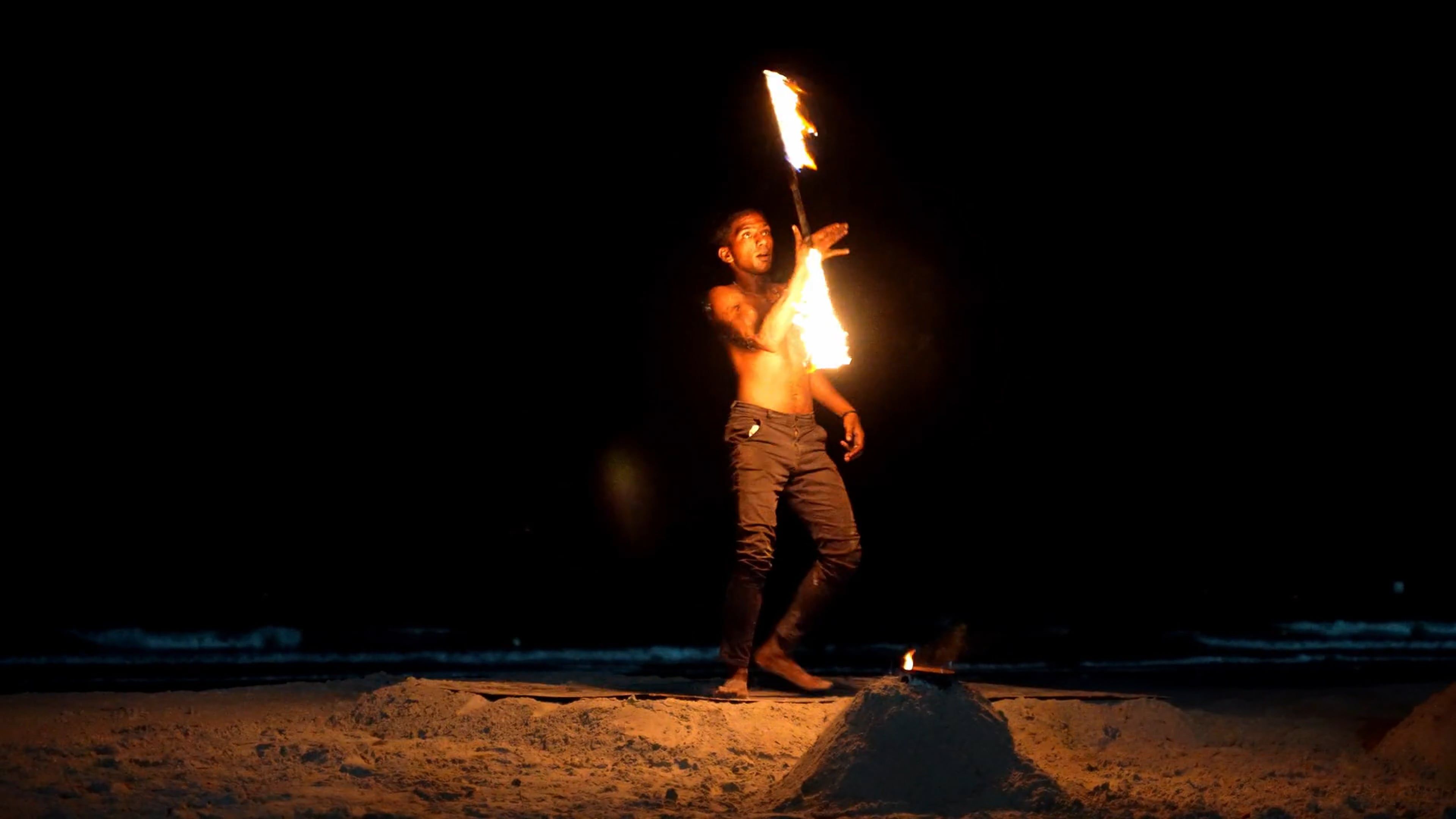 A man is performing fire tricks on the beach Free Stock Video Footage ...
