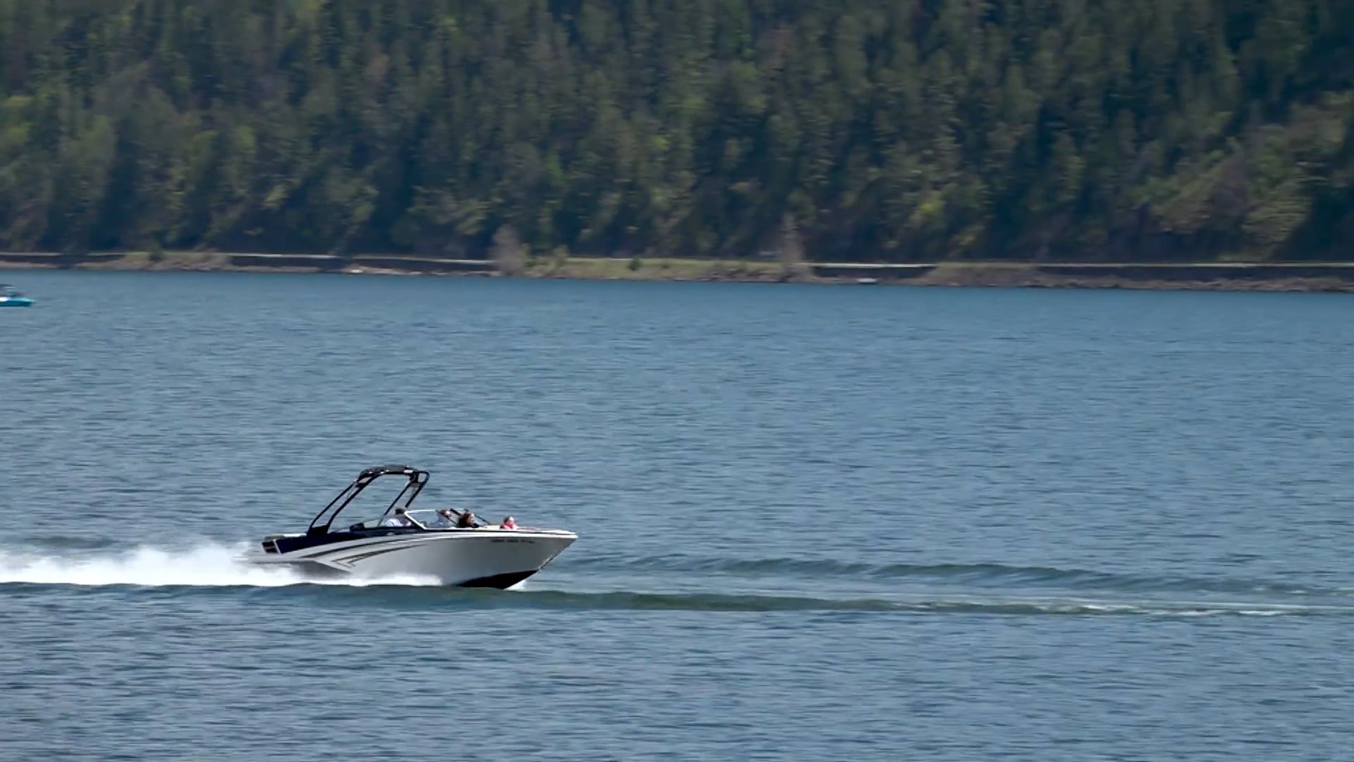 A speed boat is traveling down a lake Free Stock Video Footage, Royalty ...
