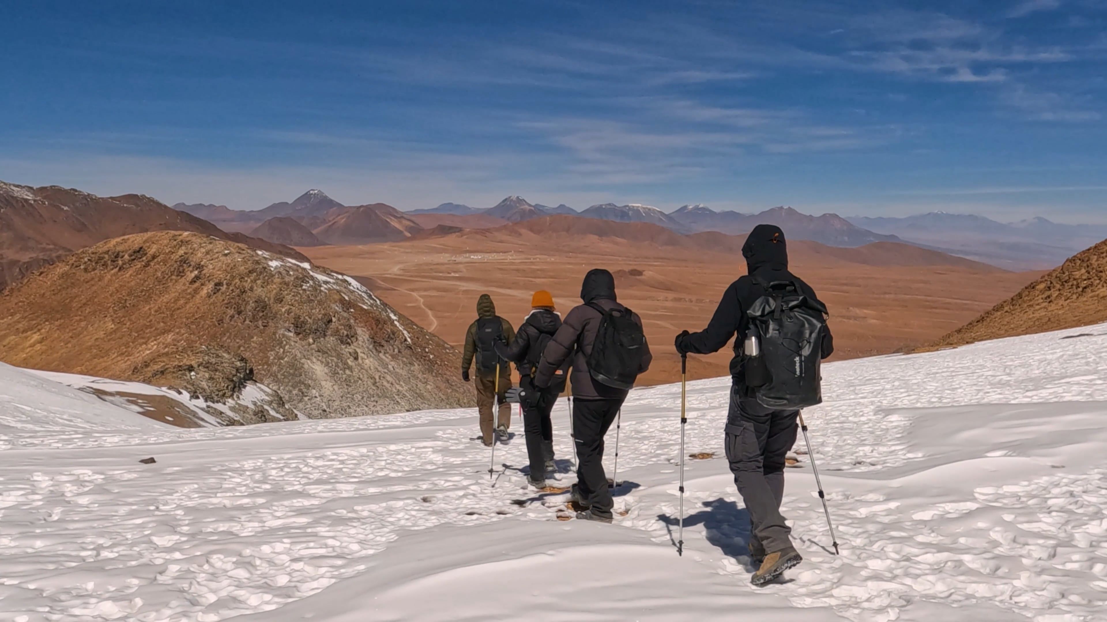 a group of people hiking up a snowy mountain 20320769 — free pexels stock footage