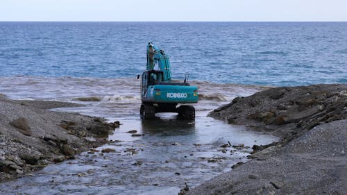 A Backhoe At Work In The Shore