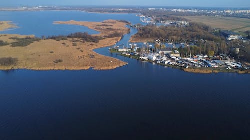 aerial view of river lake and marina early spring