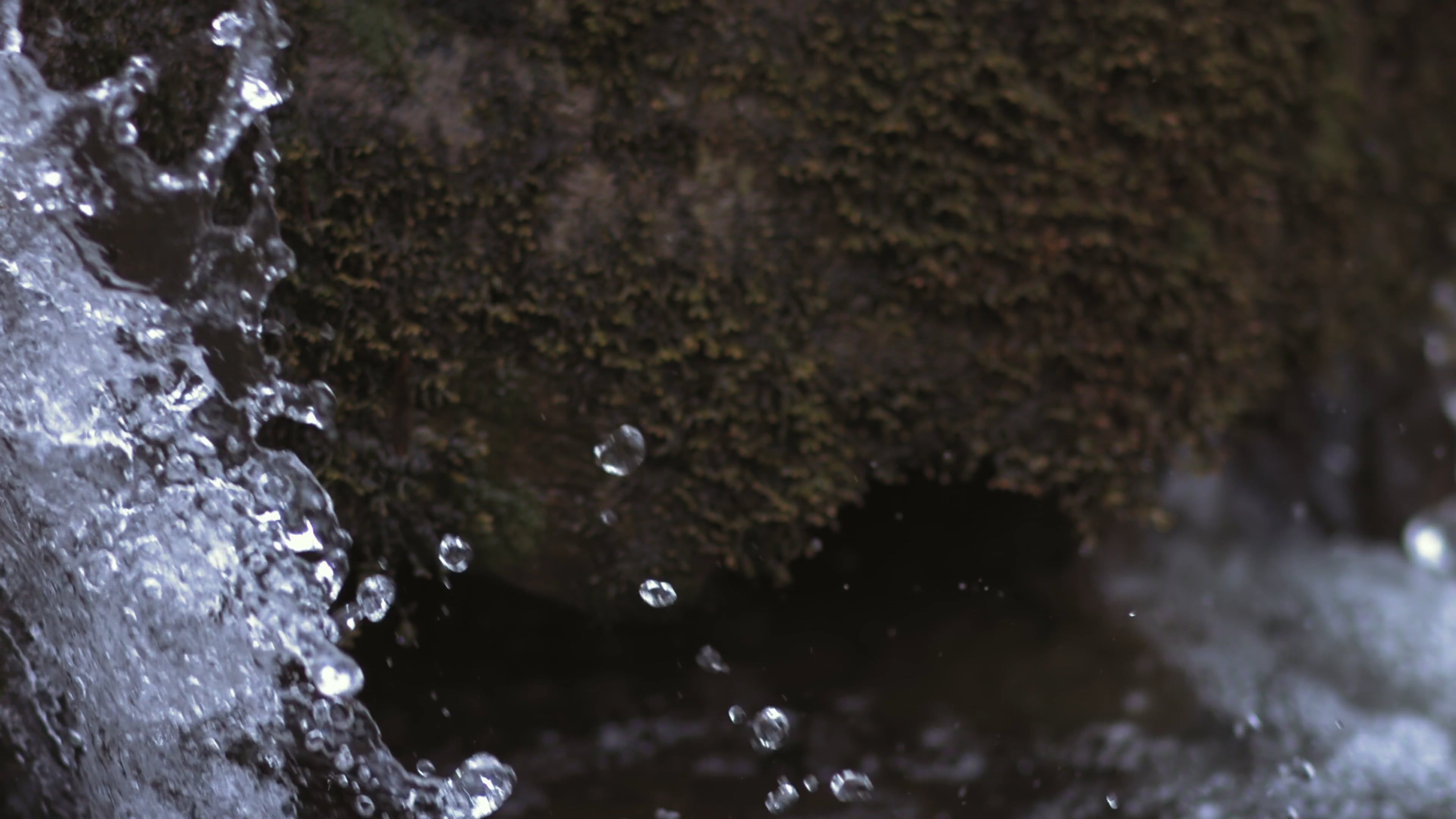 water flowing over rocks in a stream 20597713
