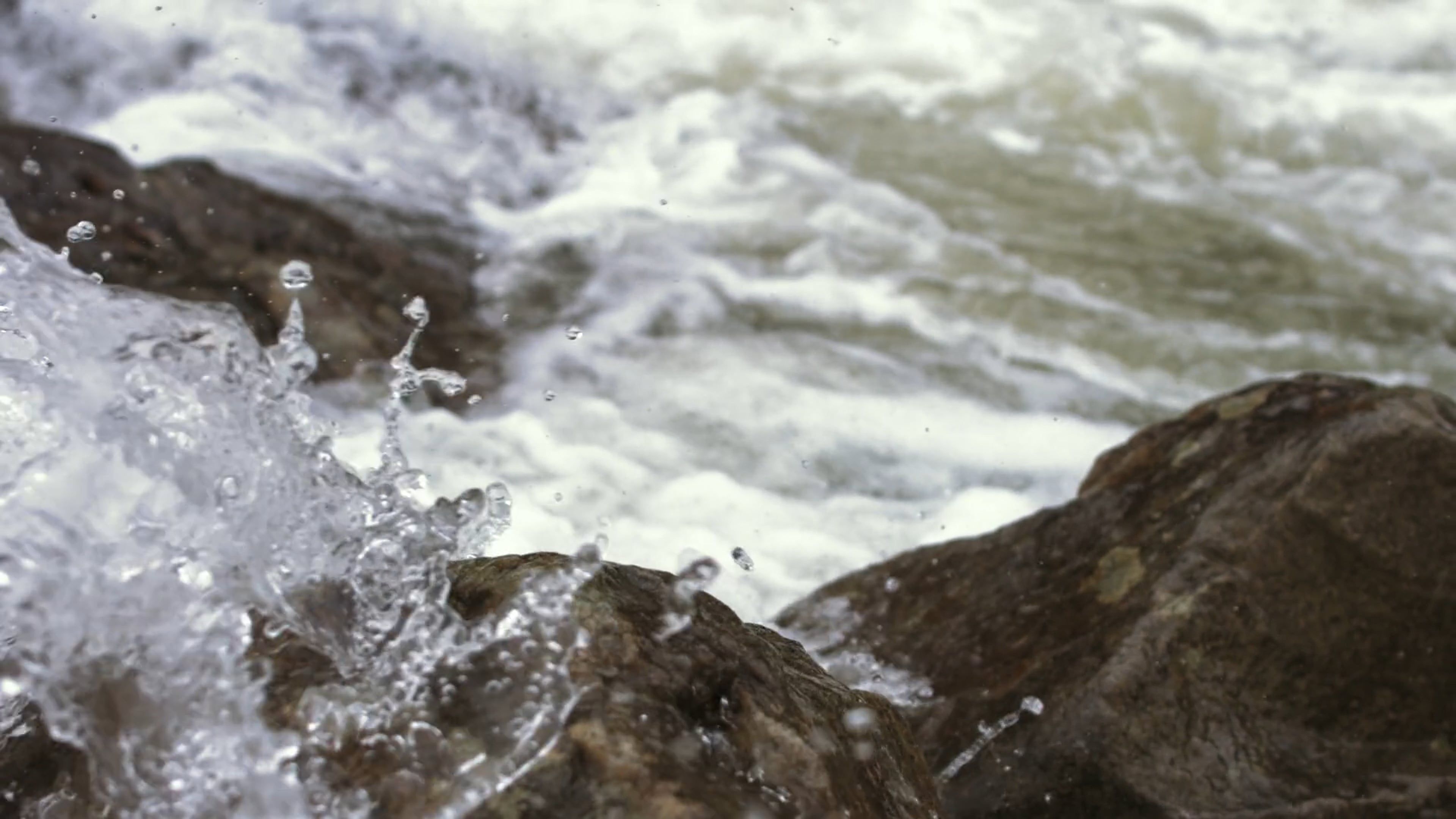 Water splashing on rocks in a river Free Stock Video Footage, Royalty ...