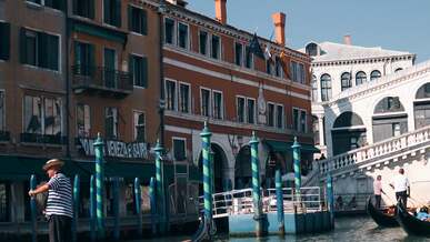 a gondola is floating down the canal in venice