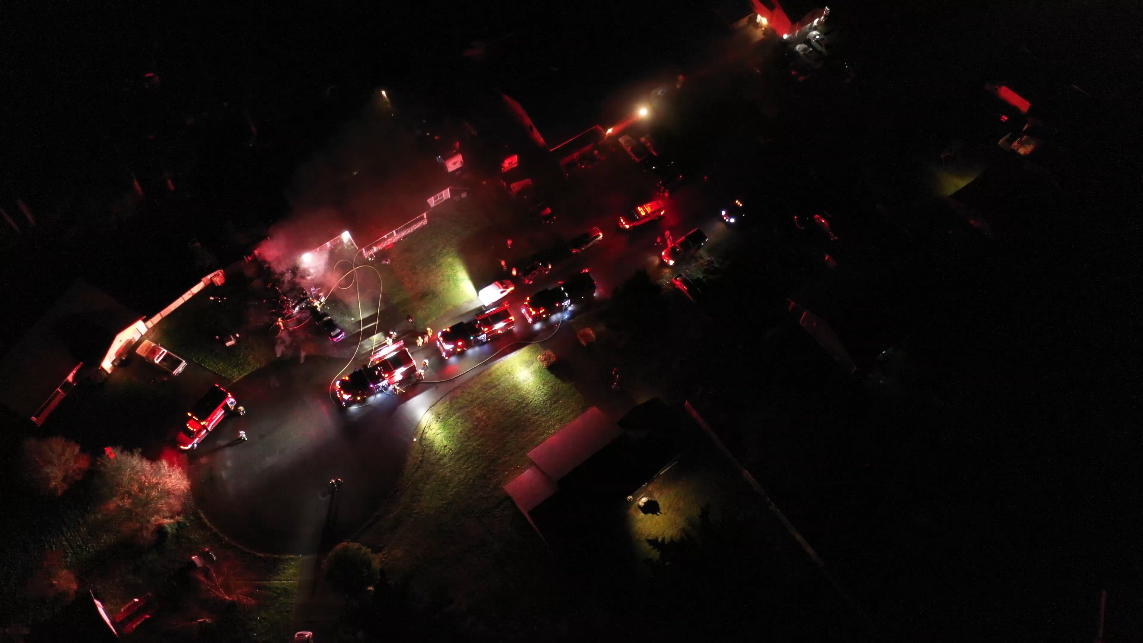 Firefighters work to put out a fire at a home Free Stock Video Footage ...