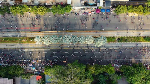 Aerial View Of People Walking In The Streets