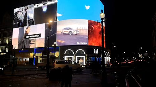 Illuminated Billboard Above A Building