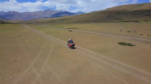 People On A Motorcycle Travelling Off Road