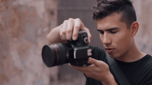 Man Holding A Camera