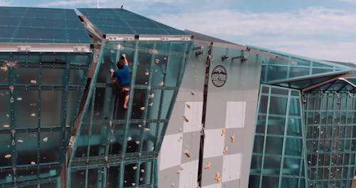 Man Climbing Rock Climbing Walls