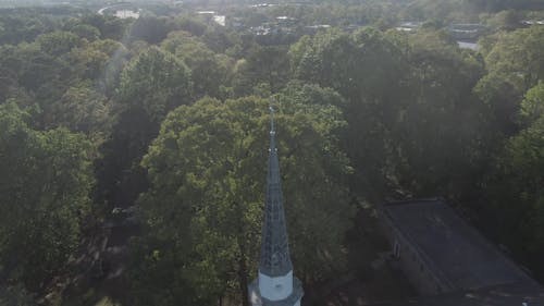View Of Church Tower In The Middle Of Trees