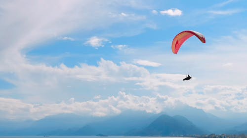 Paragliding Under A Blue Sky