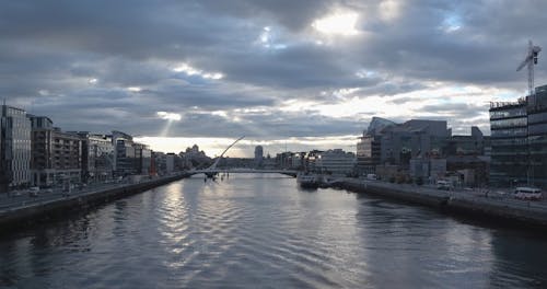 River In The City Under Gray Sky