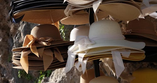 straw hats in tourist shop