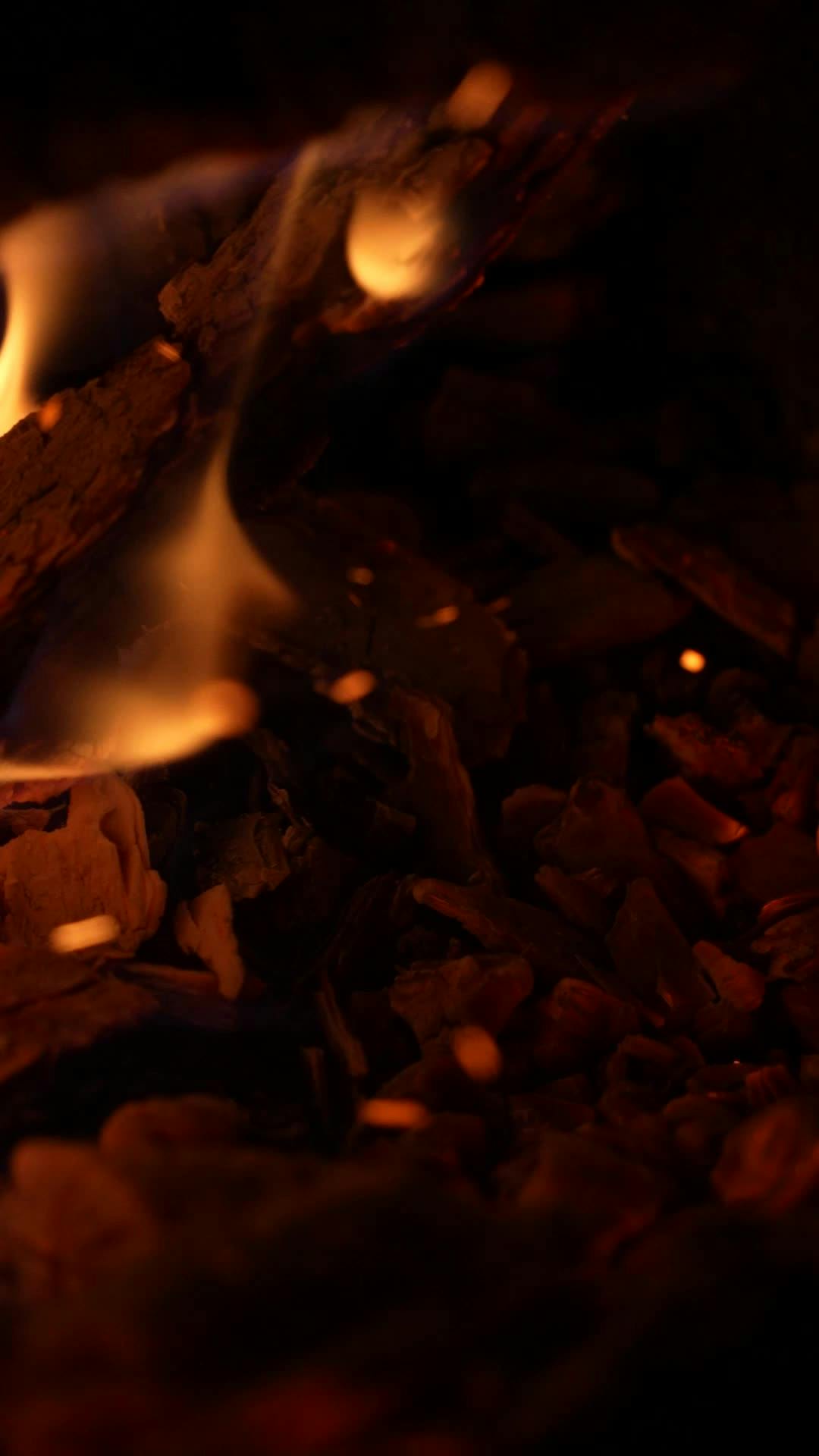 a fire is burning in a fireplace with the words firewood 24826315