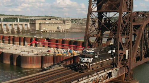 Train Crossing A Steel Railway Bridge