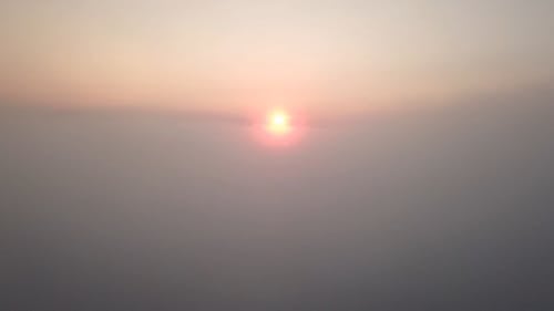 Sunset From Above The Clouds