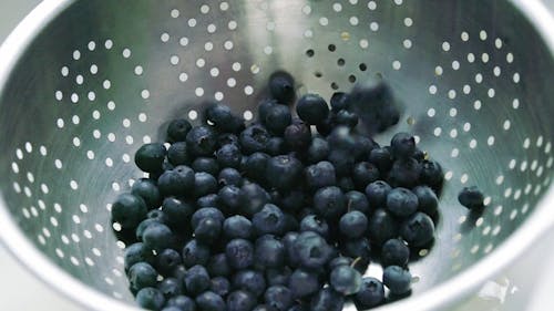 Blueberries In A Colander
