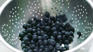 blueberries in a colander