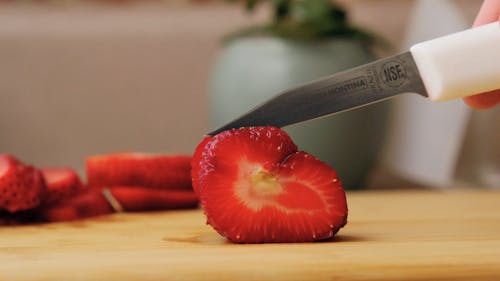 Strawberry Being Sliced