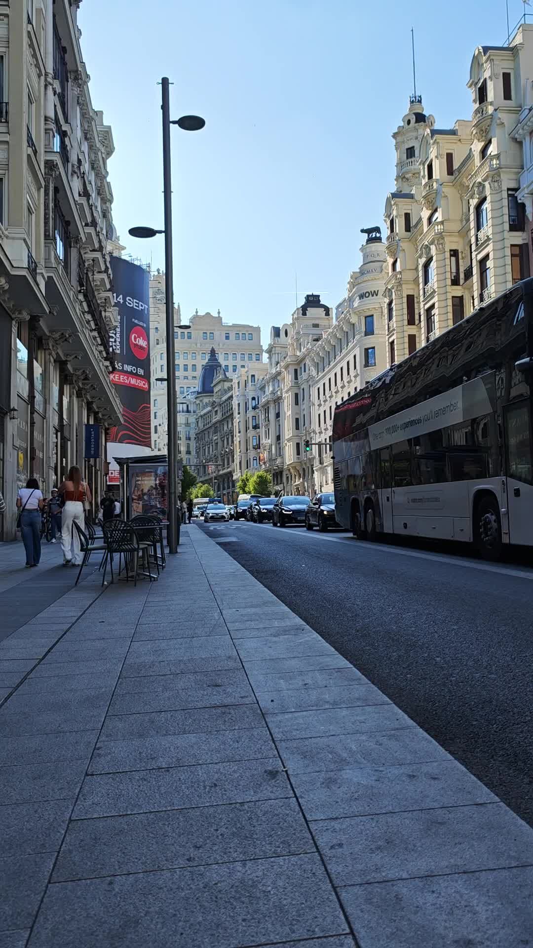 A city street with cars parked on both sides Free Stock Video Footage ...