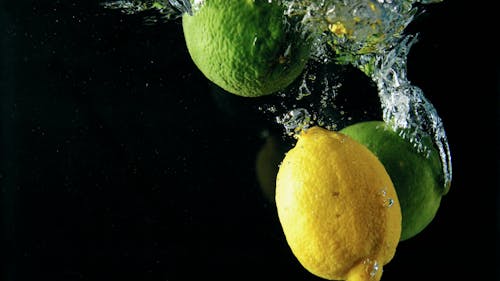 Dropping Lemons In Water