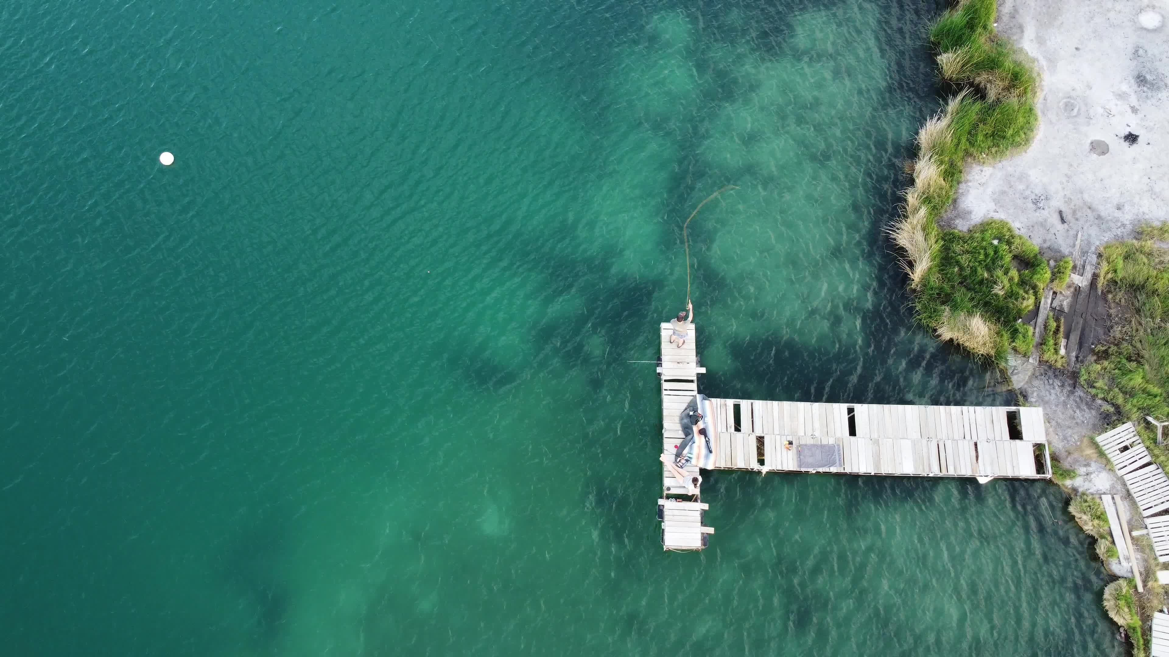 An aerial view of a dock in the middle of the water Free Stock Video ...