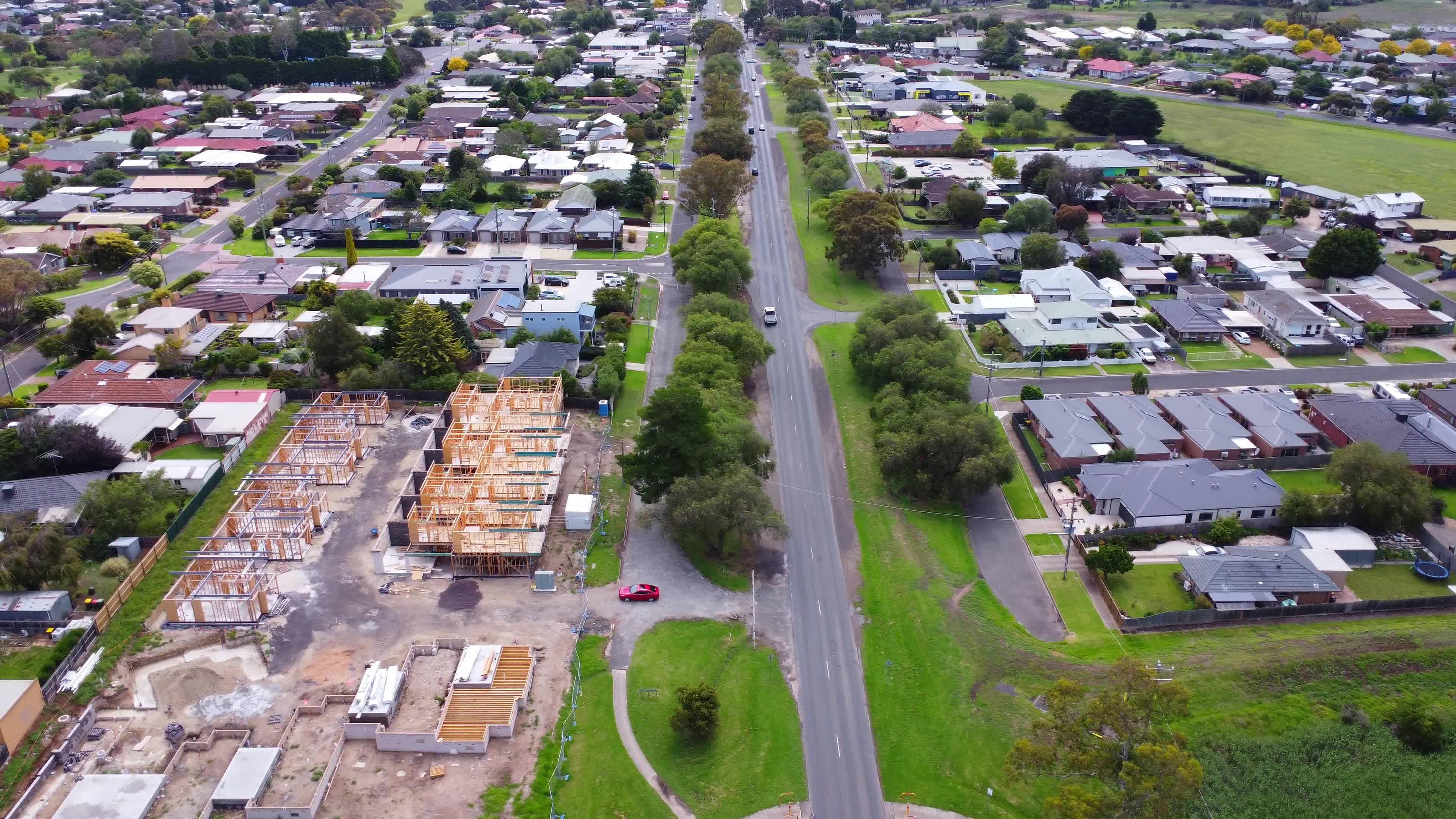 An aerial view of a residential area with houses and roads Free Stock ...