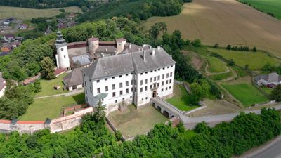 An aerial view of a castle surrounded by trees Free Stock Video Footage ...