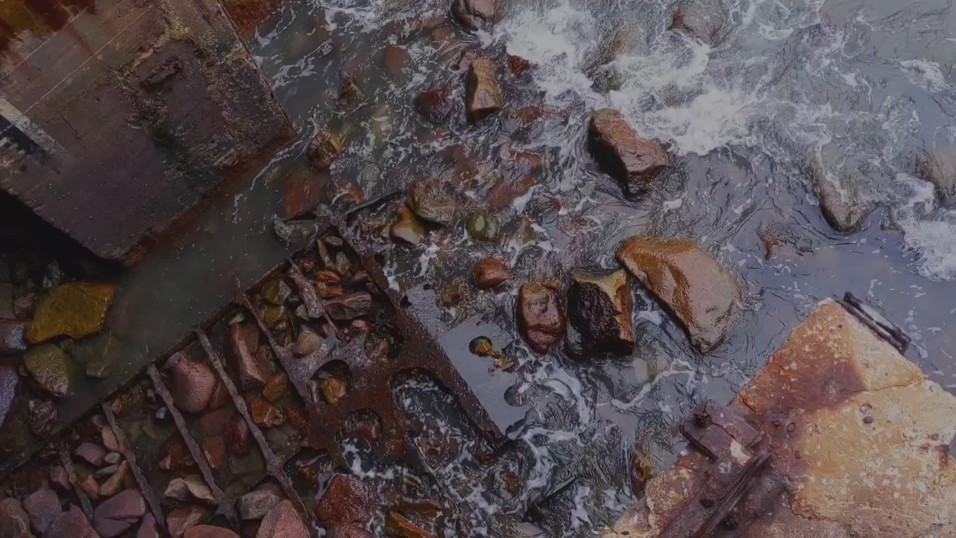An aerial view of a river with rocks Free Stock Video Footage, Royalty ...