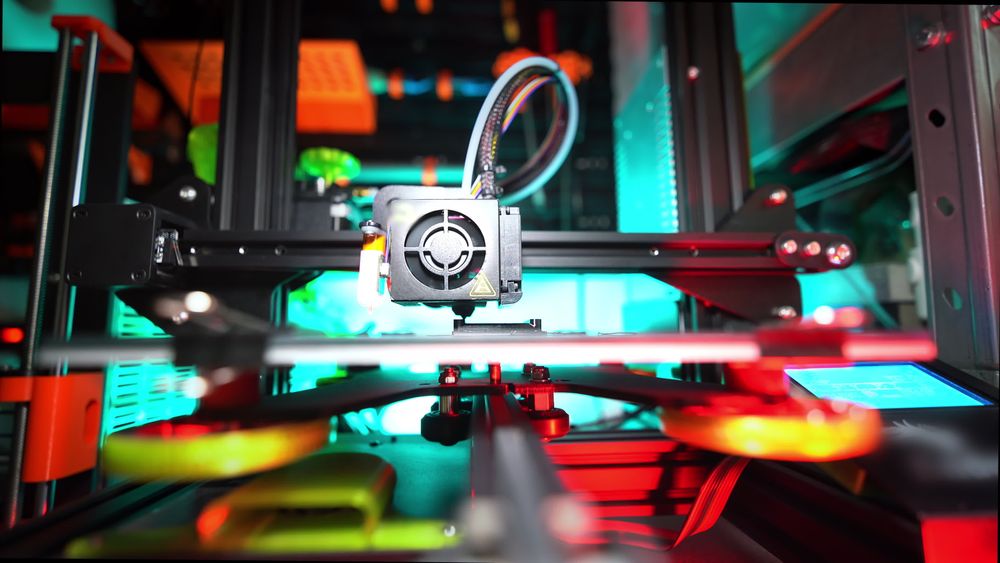 SLA printer curing a colorful high-detail miniature