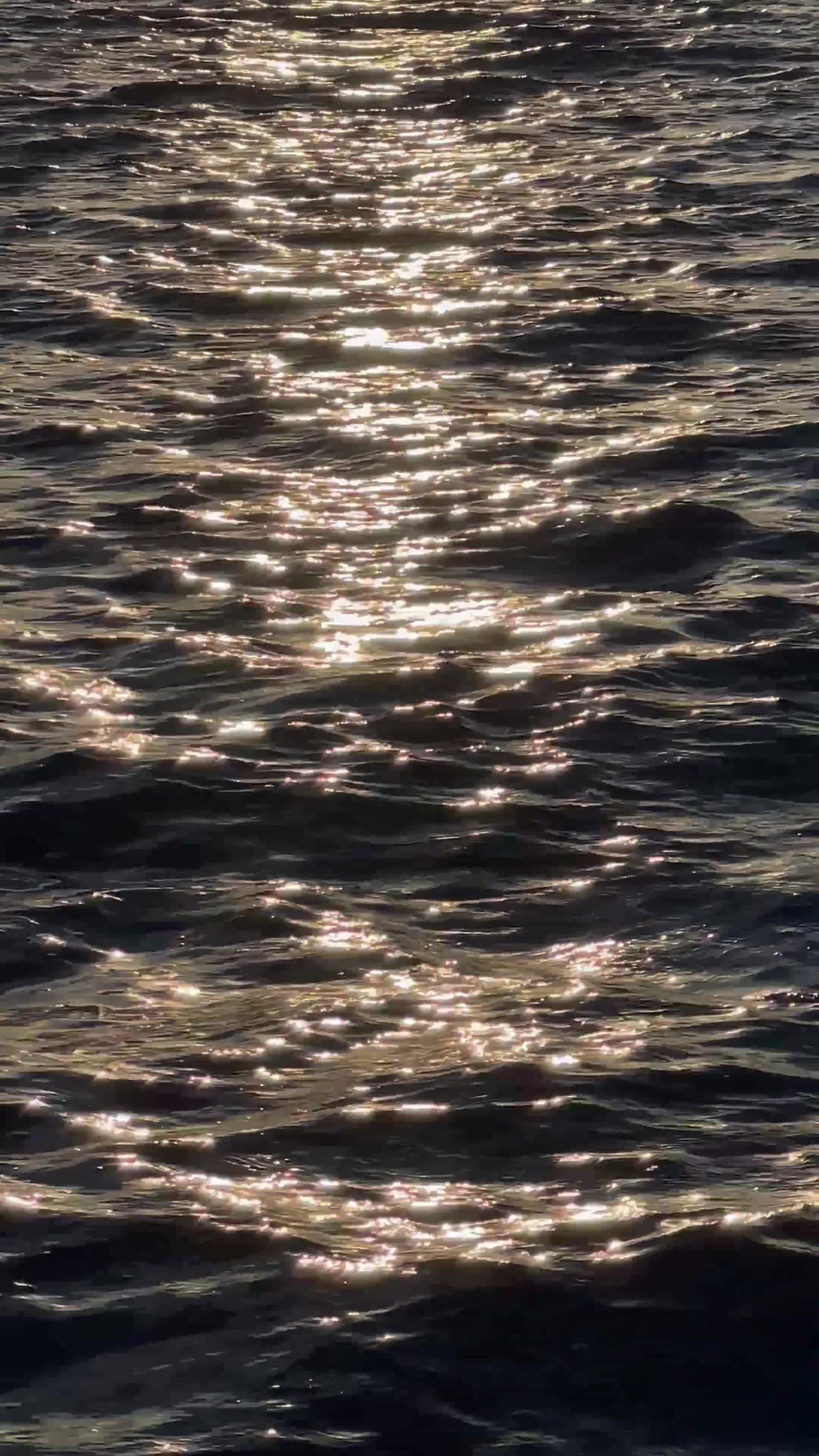 The sun shines on the water in this photo Free Stock Video Footage ...