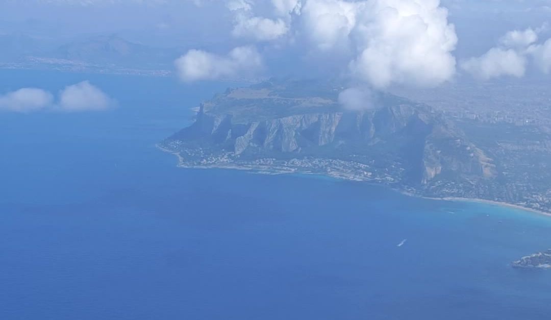 Ocean Flycam View A view from an airplane window of the ocean and clouds Free Stock Video ...