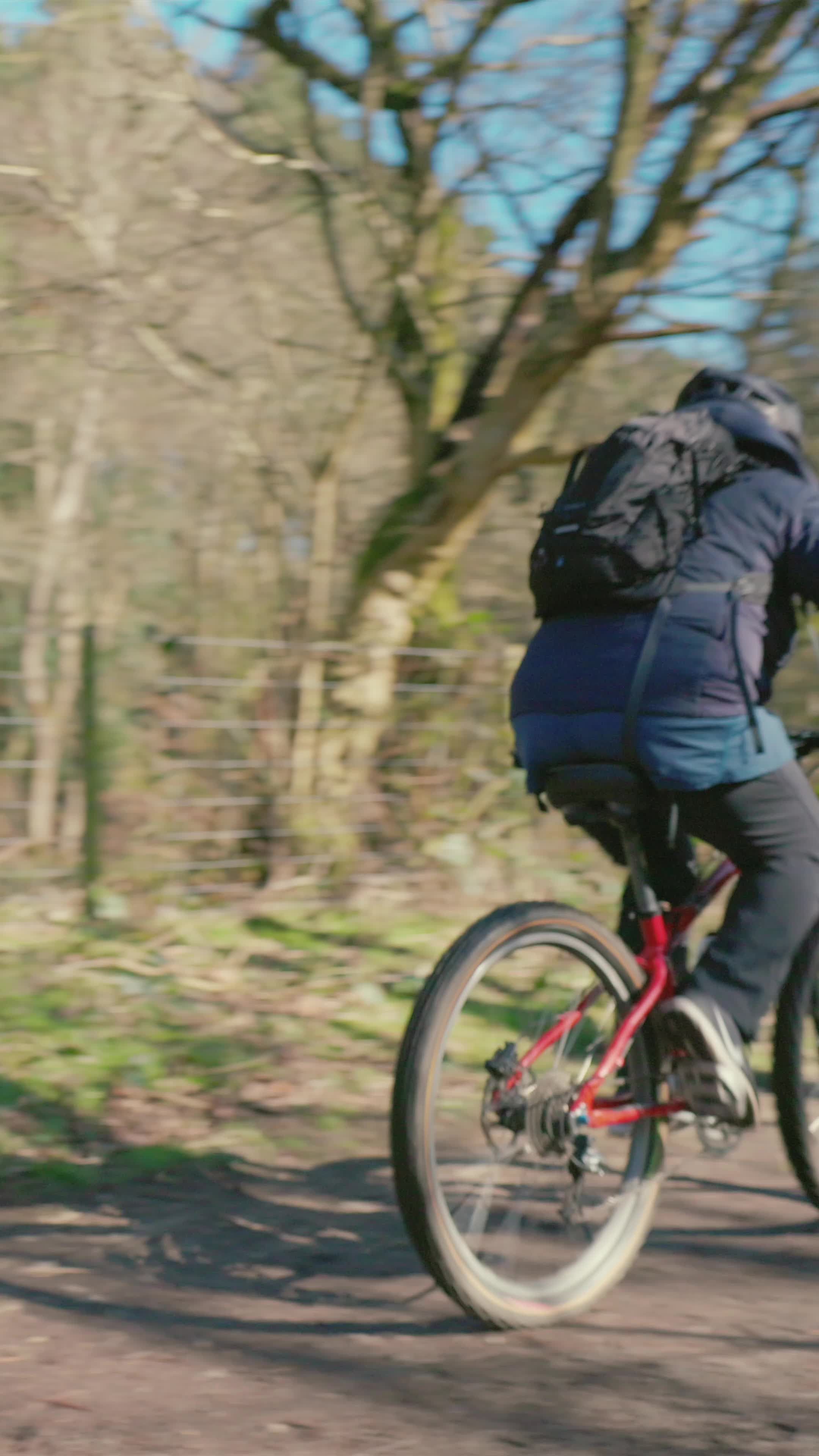 A person riding a bike down a dirt path Free Stock Video Footage ...