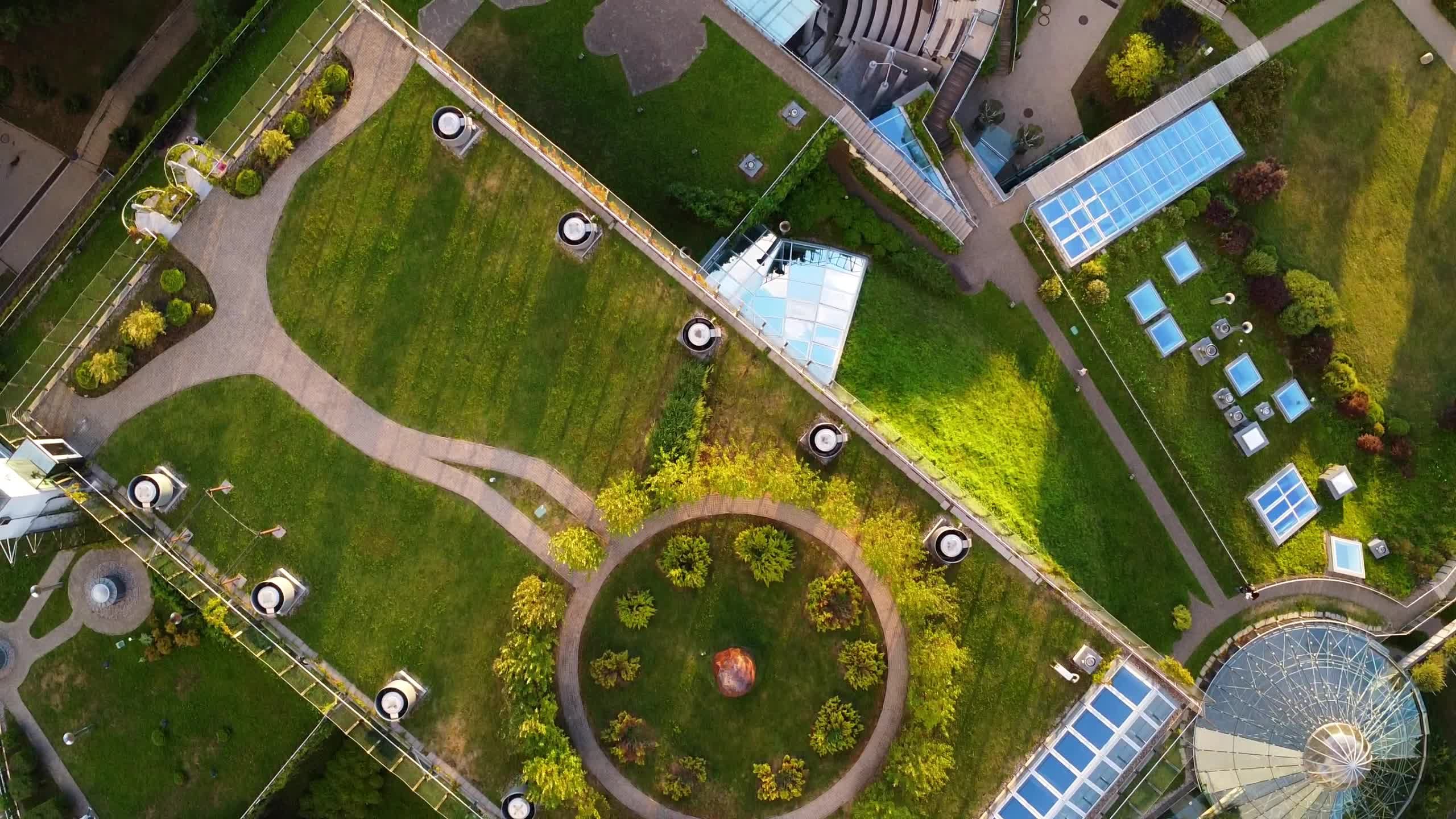 Aerial view of the park and the circular building Free Stock Video ...