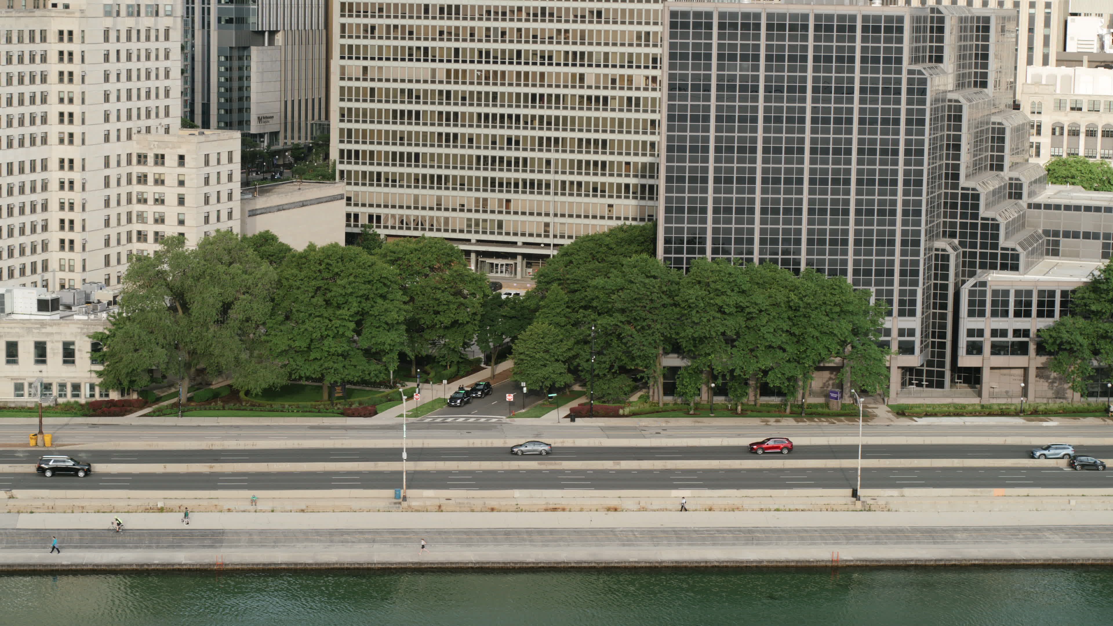 An aerial view of a city with a river and buildings Free Stock Video ...