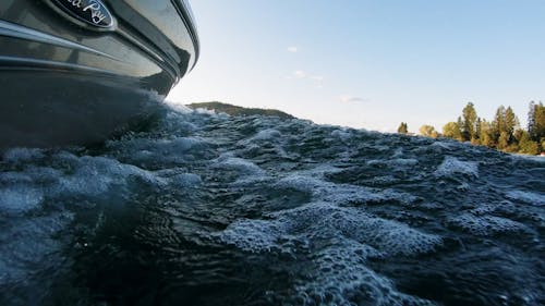 The Side Hull Of A Speeding Boat