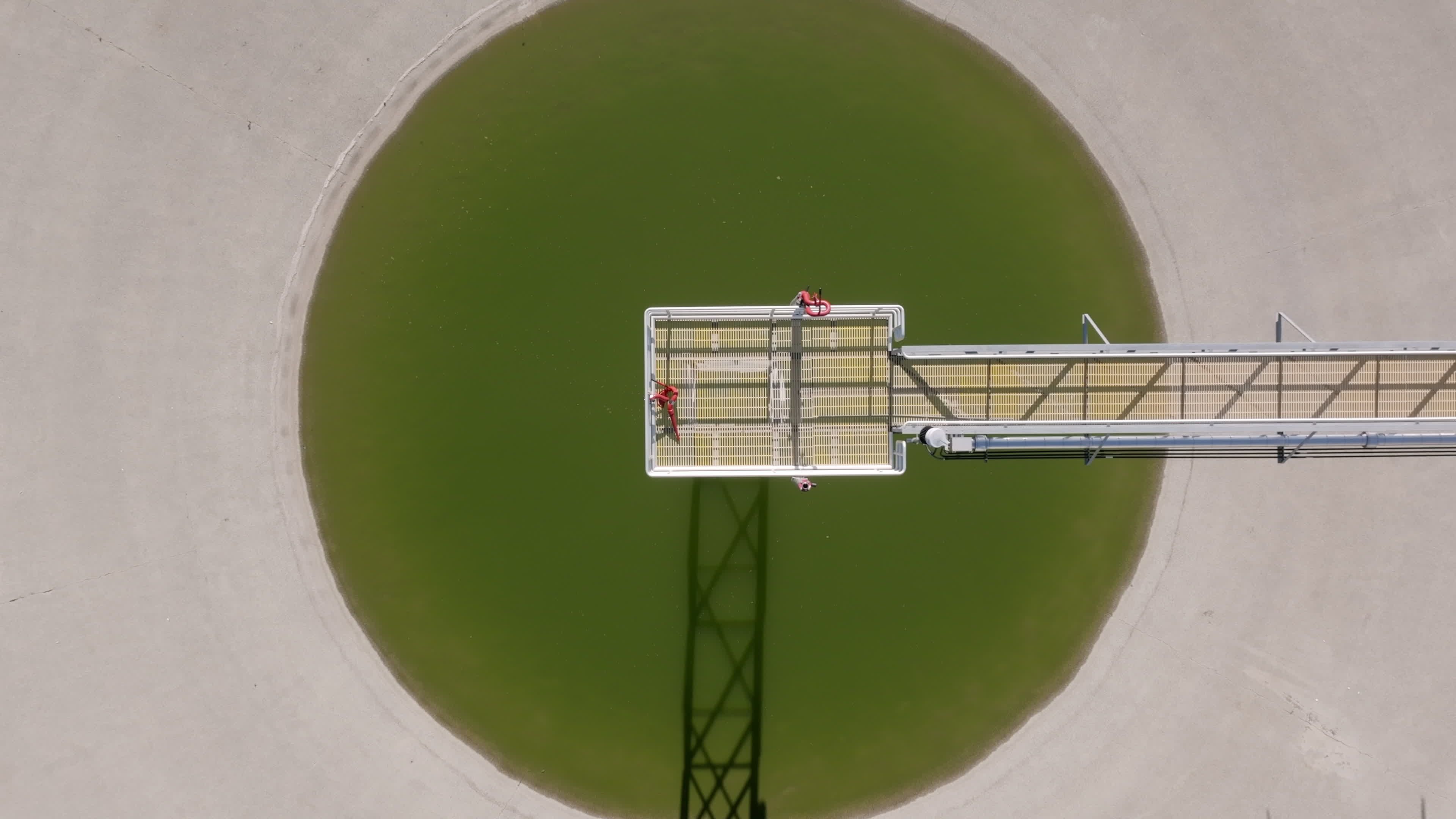 Aerial view of a water tower with a green circle Free Stock Video ...