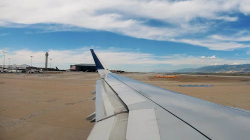 The Wing Of An Airplane Taking Off