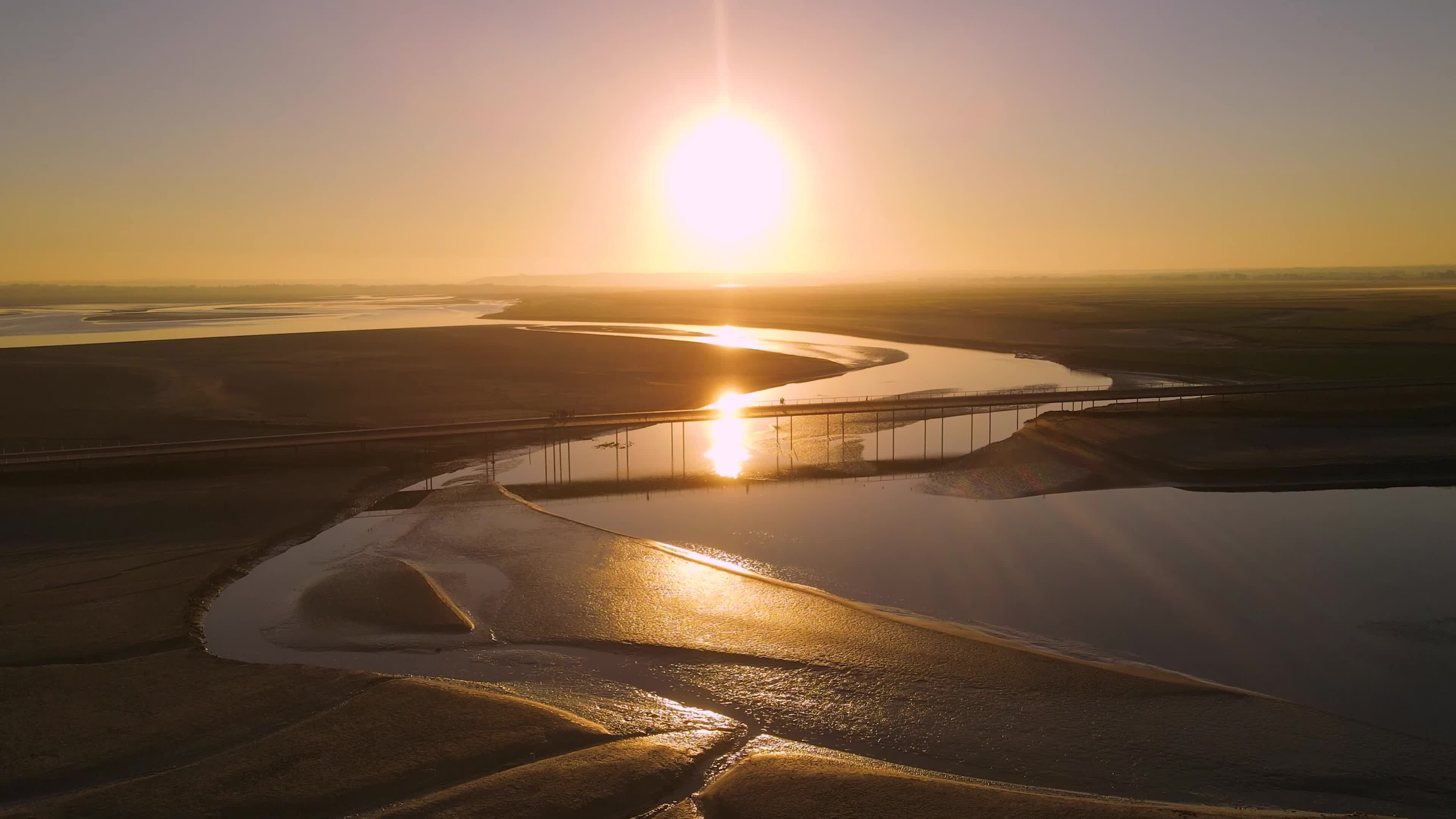 A bridge over a river at sunset Free Stock Video Footage, Royalty-Free ...