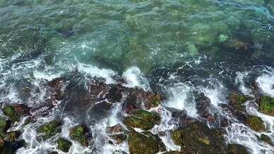 aerial view of the sea and rocks