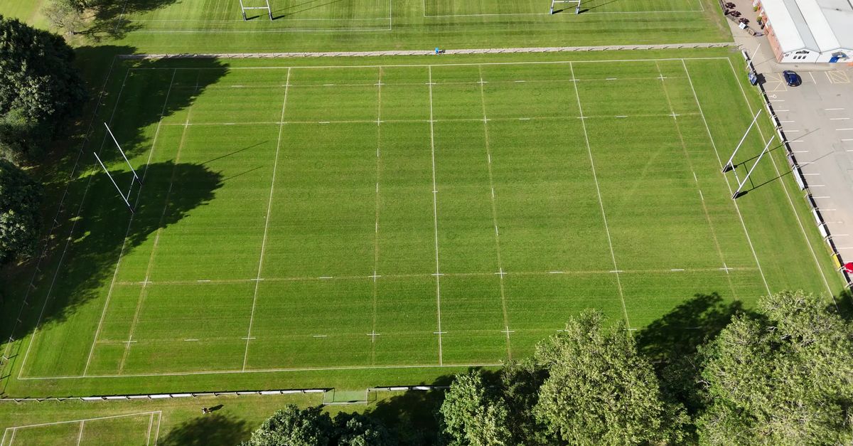 An aerial view of a rugby field with trees Free Stock Video Footage ...