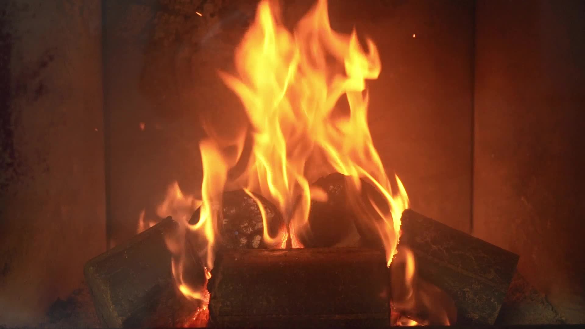 A fire is burning in a fireplace with logs Free Stock Video Footage ...