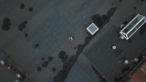 Man Dancing Hip-Hop On Rooftop